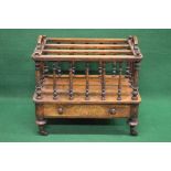 19th century mahogany three section Canterbury having turned finials and top carrying handles,