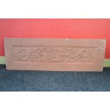 Red sandstone panel having carved foliate decoration - 57.5" x 18.75" Please note descriptions are