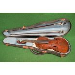 Cased un-named violin with two piece back and two bows Please note descriptions are not condition
