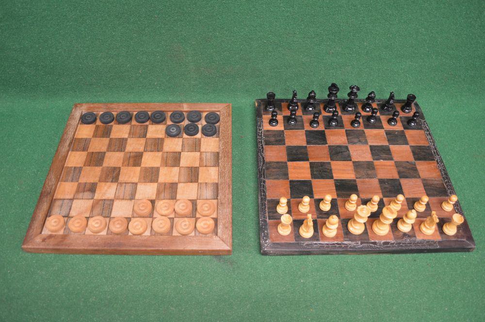 Hardwood chess board having carved borders with complete set of thirty two pieces together with