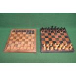 Hardwood chess board having carved borders with complete set of thirty two pieces together with