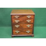 19th century mahogany and rosewood chest of drawers, the top having moulded edge over four short