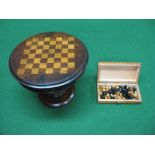 19th century mahogany tip top chess table the top supported on outward tapering column leading to