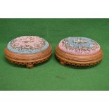 Pair of Victorian circular oak inlaid foot stools having beadwork tops and standing on bun feet -