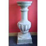 Late 20th century plinth having circular top on a cylindrical column leading to a gadrooned