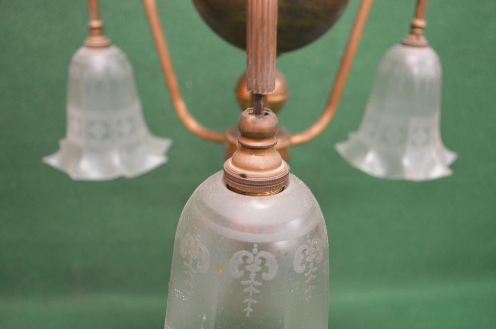 Brass three branch table lamp having reeded scrolled branches ending in down hanging frosted glass - Image 3 of 3