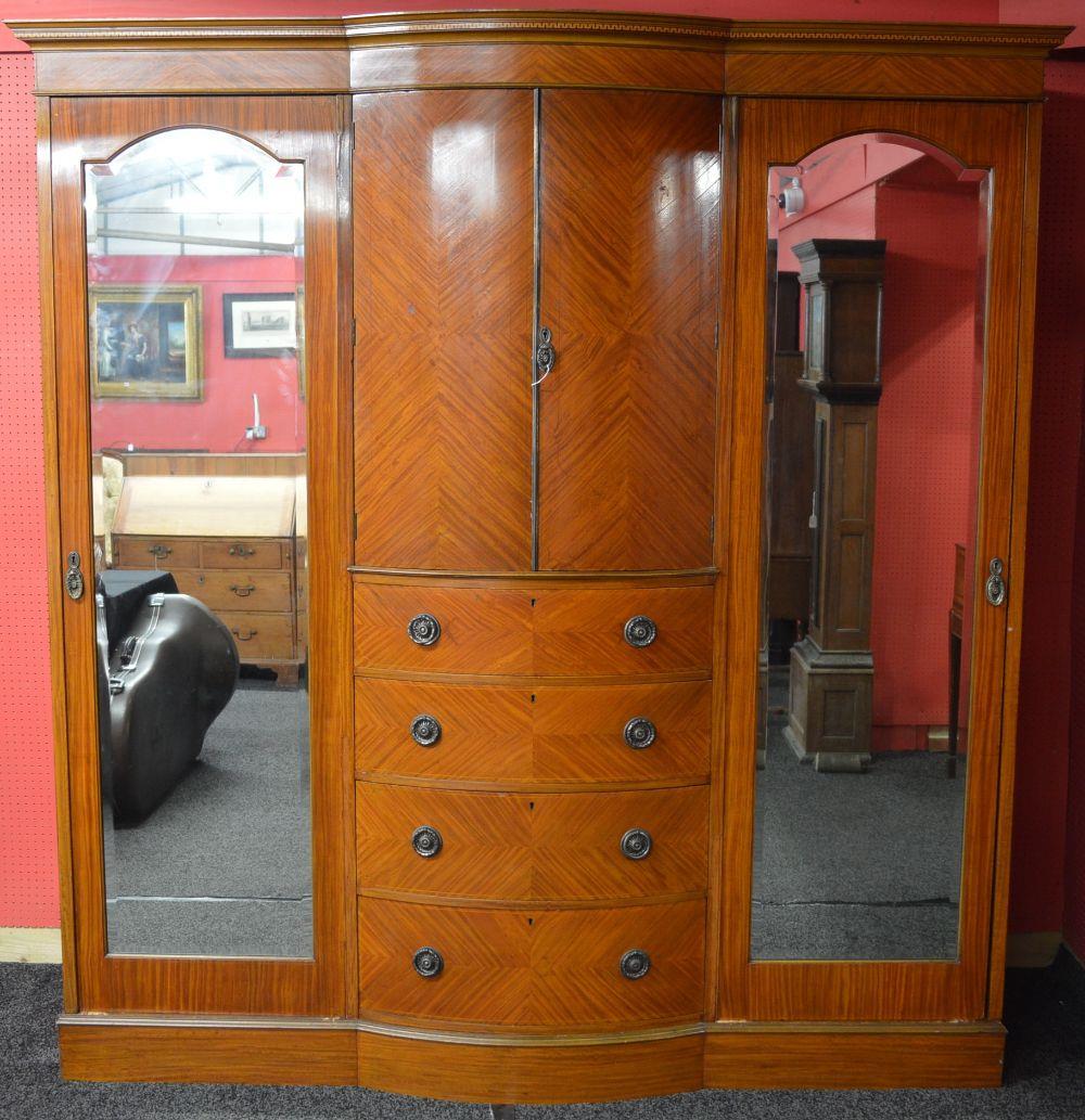 Late 19th century mahogany wardrobe having bow front centre section of two doors over four graduated - Image 2 of 2