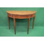 19th century mahogany demi lune cross banded fold over tea table having inlaid frieze and standing