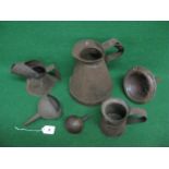 Three oil pourers and three funnels of various sizes Please note descriptions are not condition