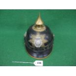 Reproduction leather pickelhaube style helmet with brass finial, badge and sliding rear vent - 10"