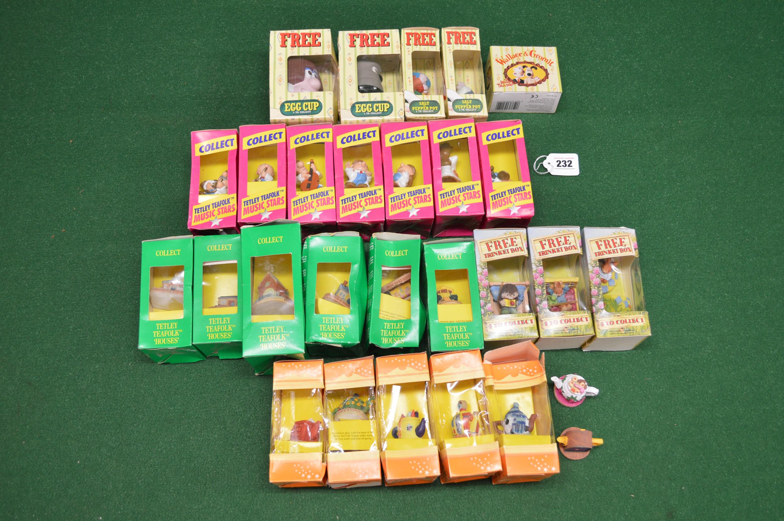 Box of boxed Tetley Tea, Typhoo Tea and Wallace & Gromit collectables Please note descriptions are