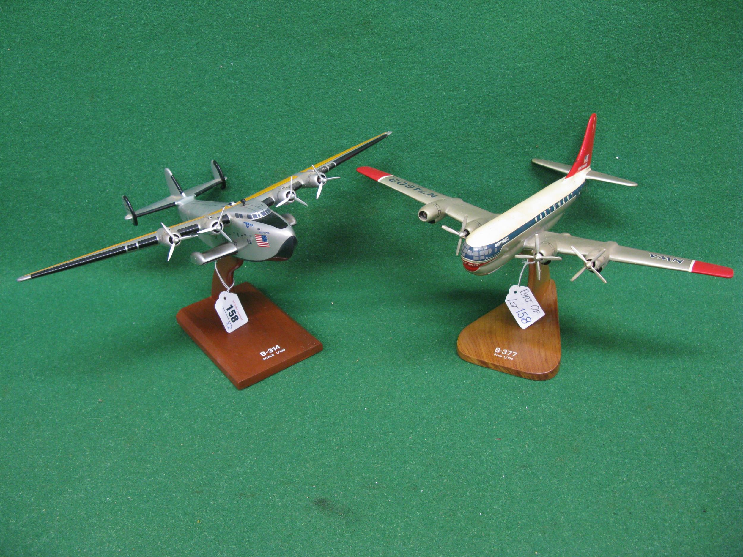 Two desktop aeroplane models with stands of US aircraft made by Toys & Models Corporation-