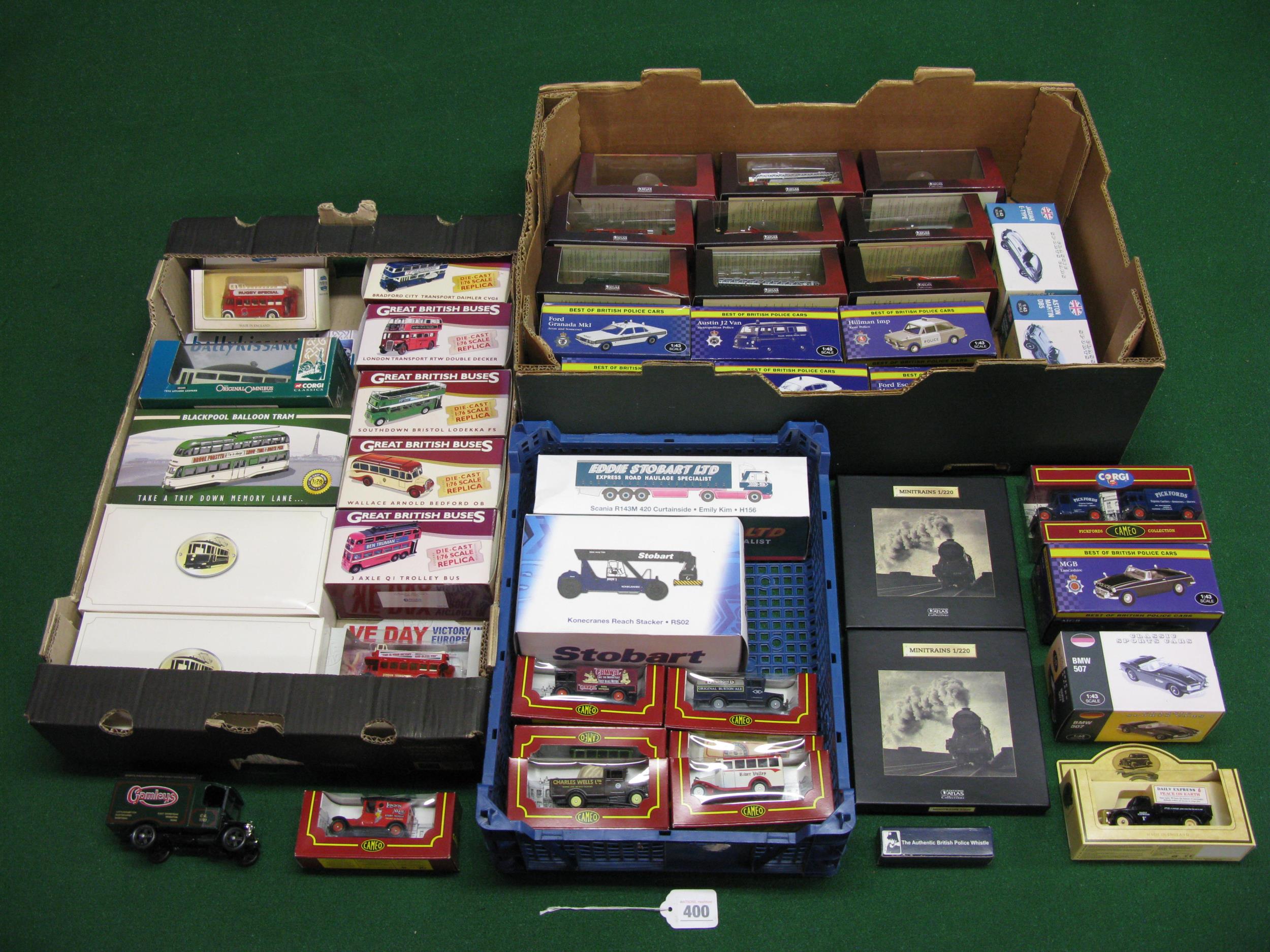 Three boxes of approx forty five model cars, buses, trams, lorries, trains and fire engines by