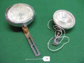 Large oval 9" Notek Drive-Master lamp together with a 7" Lucas, both chromed with substantial