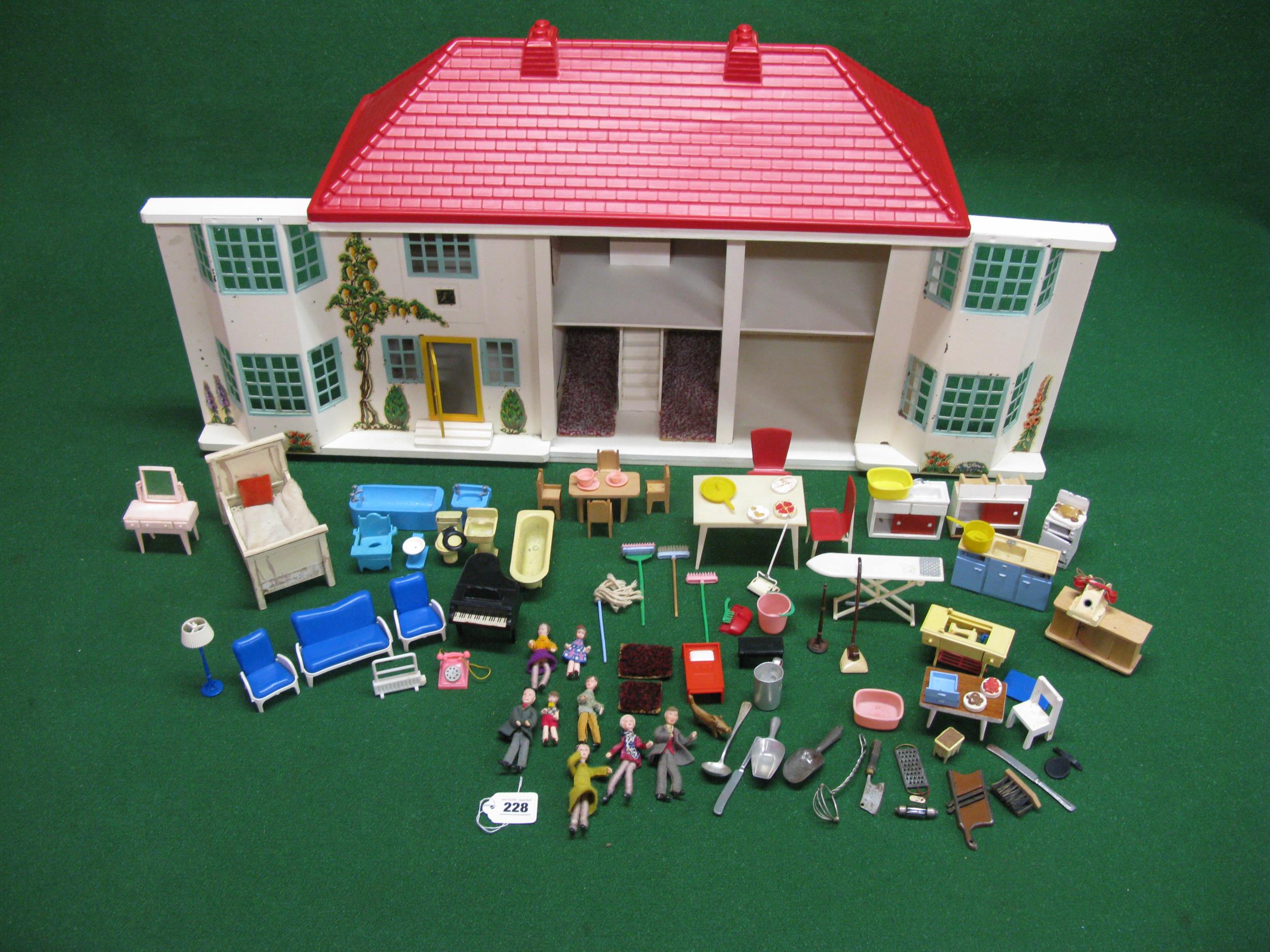 Double fronted wood and tinplate dolls house with plastic roof and interior lights together with a