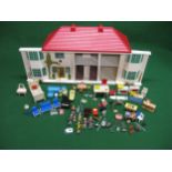 Double fronted wood and tinplate dolls house with plastic roof and interior lights together with a