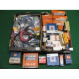 Two boxes of assorted new old stock filters and spark plug leads Please note descriptions are not