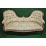 Victorian walnut double ended showwood frame settee having button back, padded arms and over stuffed