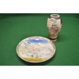 Japanese Satsuma wall charger, decorated with a landscape scene with two warriors in the