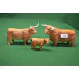 Three Beswick figures of Highland bull, cow and calf Please note descriptions are not condition