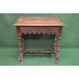 20th century oak carved single drawer side table the top having carved border over single carved