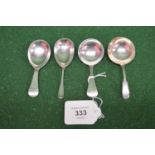 Group of four various silver caddy spoons (1.7ozt) Please note descriptions are not condition