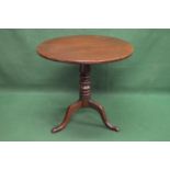 19th century mahogany tip top occasional table the top supported by a turned column leading to three