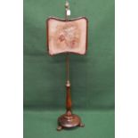 Victorian mahogany and rosewood pole screen having floral embroidered screen supported on brass