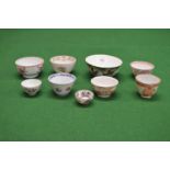 Group of nine Oriental ceramic tea bowls of various sizes - largest 4.75" diameter Please note