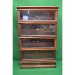 Mahogany four section Globe Wernicke bookcase, each section having glazed up and over door, makers