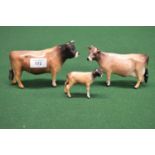 Three Beswick figures of Jersey bull, cow and calf Please note descriptions are not condition