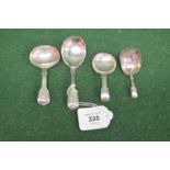 Group of four various silver caddy spoons (1.4ozt) Please note descriptions are not condition