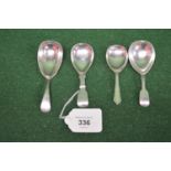 Group of four various silver caddy spoons (2.1ozt) Please note descriptions are not condition