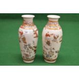 Pair of Satsuma vases decorated with figures, birds and plants, faint red backstamp on base - 12"
