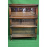 Oak three section Globe Wernicke bookcase, each section having glazed up and over door and side