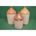 Three Doulton Lambeth stoneware bottles all stamped CSSAL with earring handles and two having tap