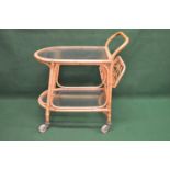 Angraves 20th century bamboo drinks trolley having raised handle over bottle basket and two glass