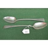 Pair of silver basting spoons having Old English pattern handles, hallmarked for London 1807 (7.