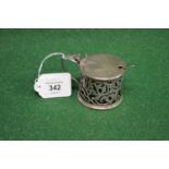 Silver mustard pot having pierced sides, hinged lid and blue glass liner, hallmarked for London 1904