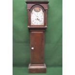 Unnamed oak cased grandfather clock having painted arch top dial with pierced black hands and