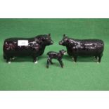 Three Beswick figures of Angus bull, cow and calf Please note descriptions are not condition
