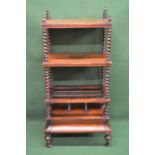 19th century rosewood three tier whatnot/Canterbury, each tier supported by twist supports leading
