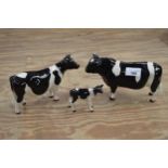 Beswick figures of Frisian bull, cow and calf Please note descriptions are not condition reports,