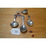 Group of four various silver caddy spoons (1.4ozt) Please note descriptions are not condition