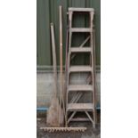 Wooden folding step ladder, wooden bread shovel and a rake Please note descriptions are not