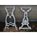 Pair of painted metal garden table legs and one other Please note descriptions are not condition