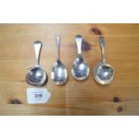 Group of four various silver caddy spoons (1.7ozt) Please note descriptions are not condition