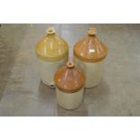 Three Doulton Lambeth stoneware bottles - tallest 20" Please note descriptions are not condition