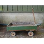 Low sided wood and metal four wheel hand barrow Please note descriptions are not condition