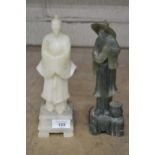 Possibly green Jade figure of a fisherman - 9.5" tall together with one other - 10" tall Please note